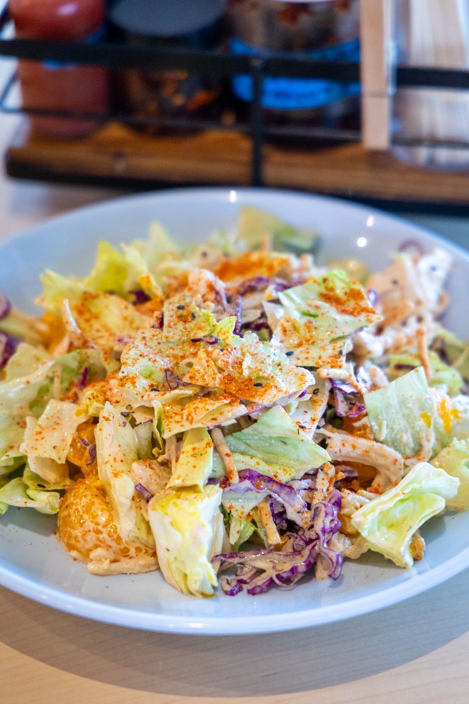 Chinese chicken salad with crispy noodles, cabbage and orange